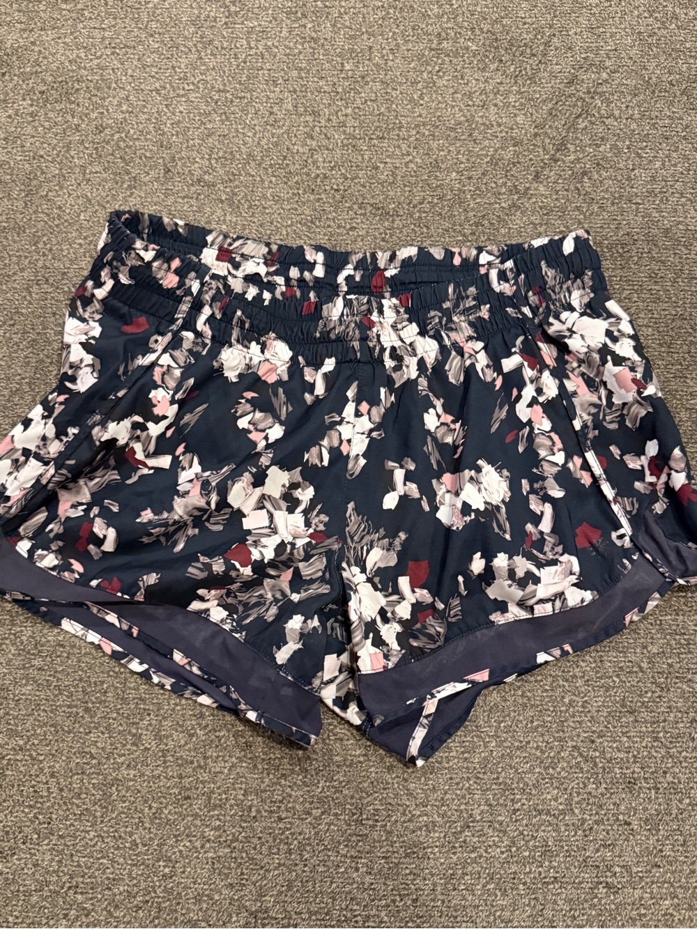 Athleta Mesh Running shorts 4” women size medium Navy Floral